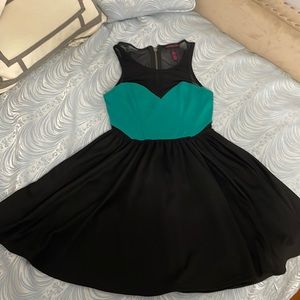 Mini party dress. Teal and green with mesh chest and side accents